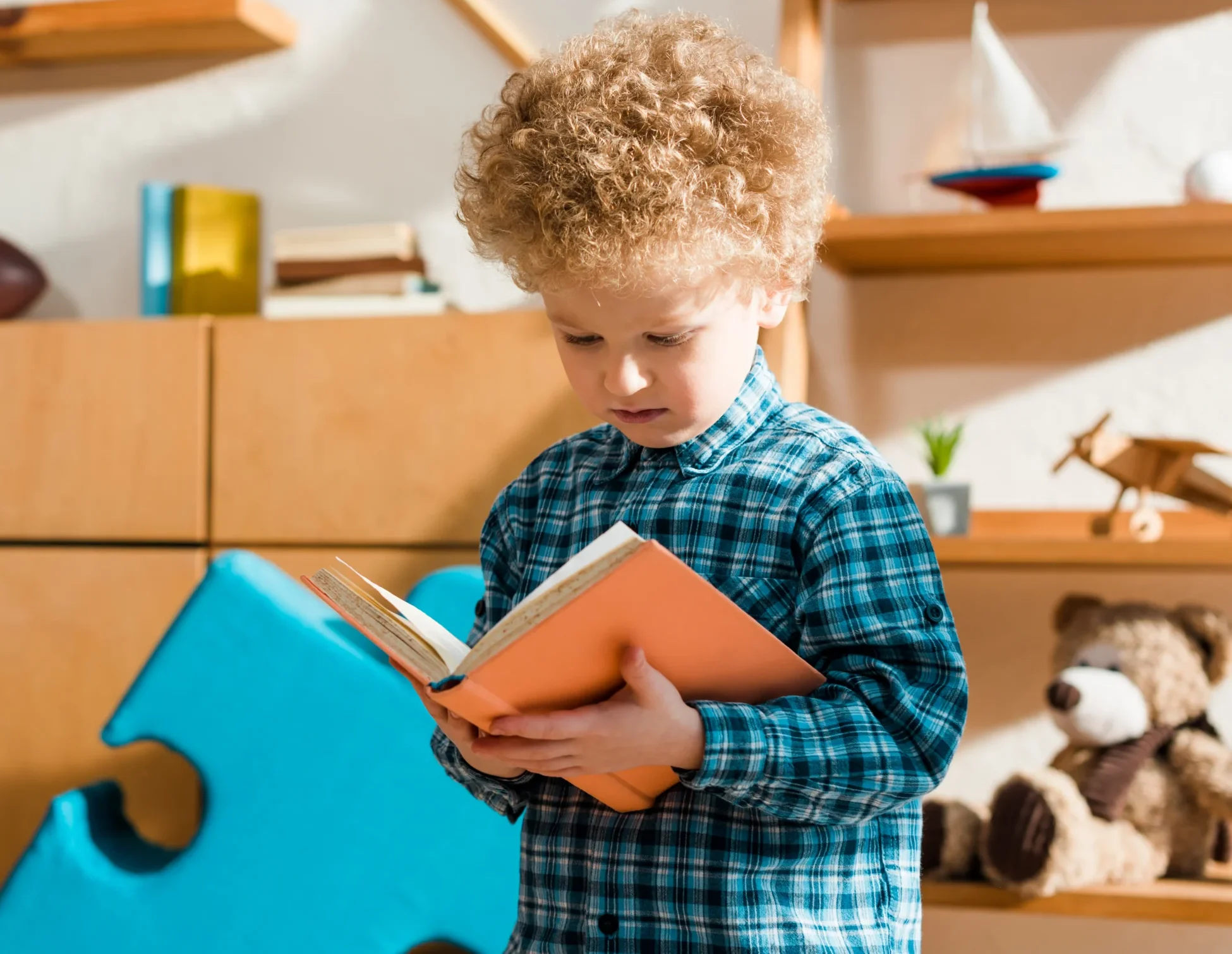 Child dressed as a marketing director comparing scattered marketing ideas with a clear strategic plan.